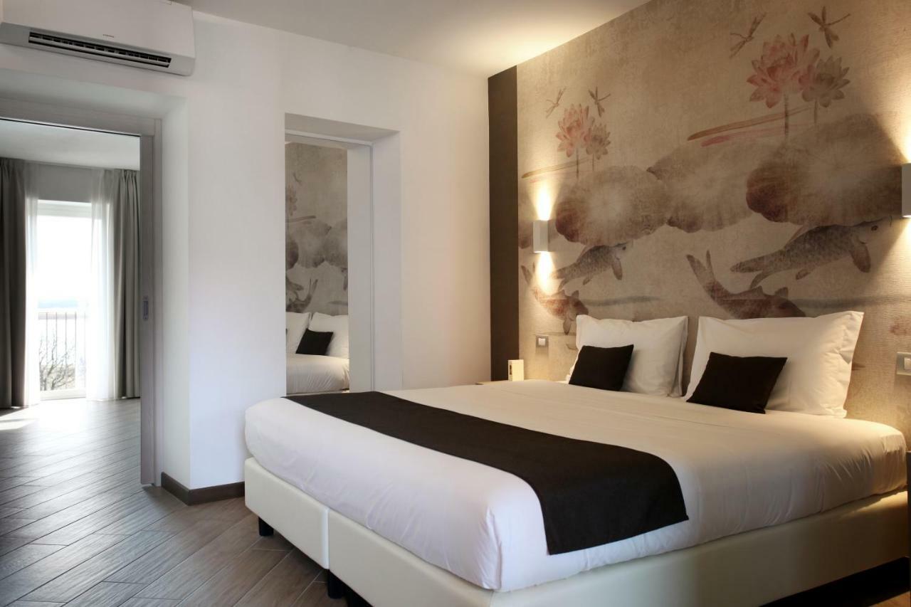 Hotel Ponti Angera Bagian luar foto